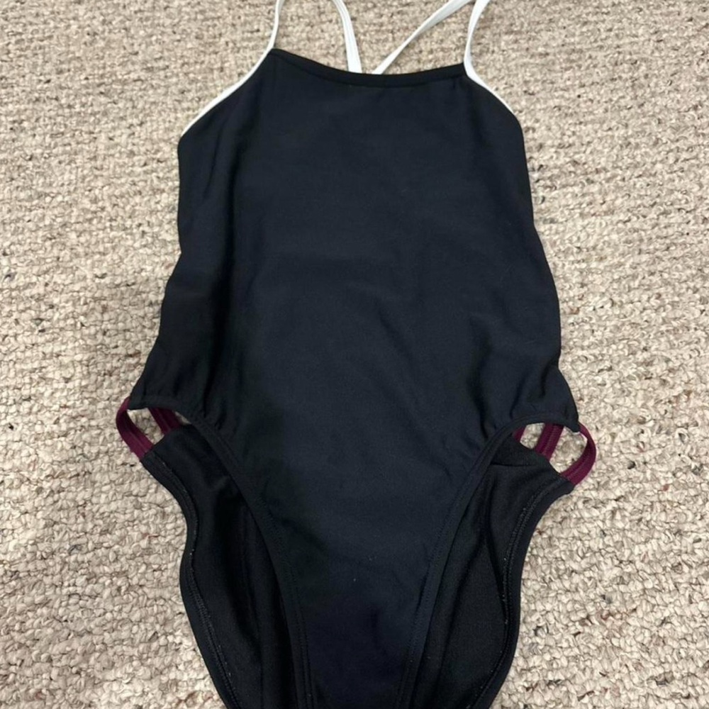 Jolyn Black julian 2 suit with White Straps and burgundy side details
